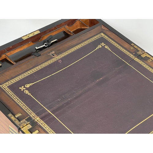 14 - A large Victorian Burr Walnut brass bound writing slope. Closed 50x26.5x19cm