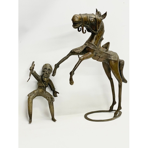 16 - A large vintage Benin Bronze warrior on horse. 41x56cm