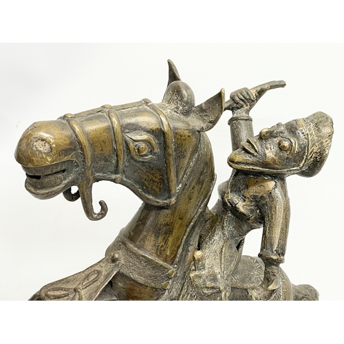 16 - A large vintage Benin Bronze warrior on horse. 41x56cm