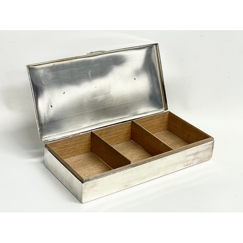 655 - A large vintage silver plated tabletop cigarette box. 25.5x13x5cm