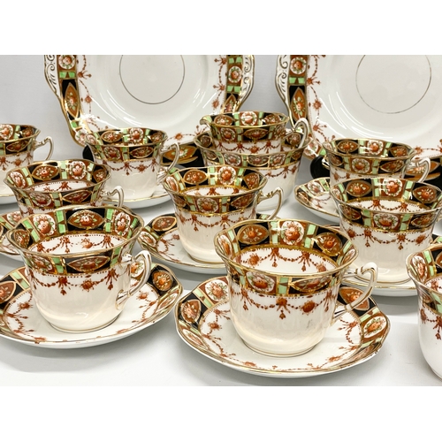 656 - A 28 piece early to mid 20th century Roslyn China tea set.