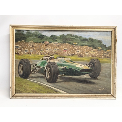 571 - A racing car oil painting signed Nesbitt. 66.5x46cm with frame.