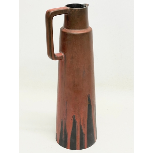 637 - A Ceramano Stromboli Mid Century pottery jug. Number 204. West Germany. 32cm