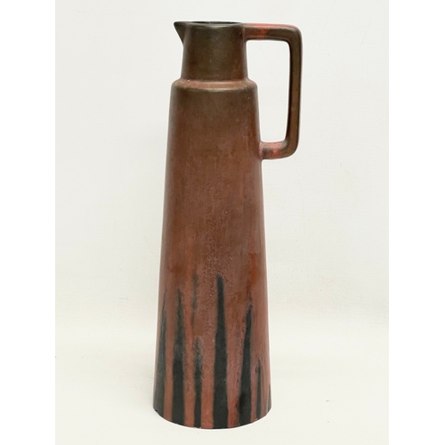 637 - A Ceramano Stromboli Mid Century pottery jug. Number 204. West Germany. 32cm