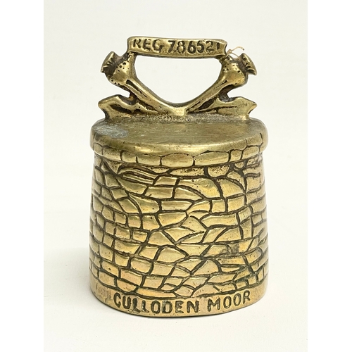 643 - An early 20th century Culloden Moor brass bell. The Cairn. Reg 786521. 8.5cm