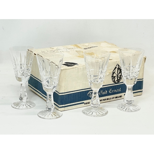 647 - A set of 4 Waterford Crystal ‘Kylemore’ pattern glasses in box. Glasses measure 13.5cm