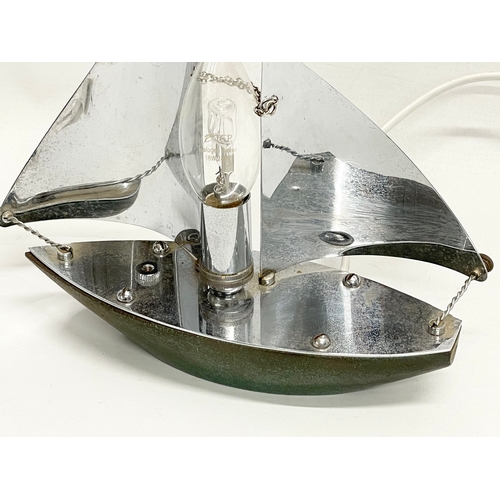 37 - A 1930’s Art Deco chrome lamp in the style of a yacht. 22x23cm