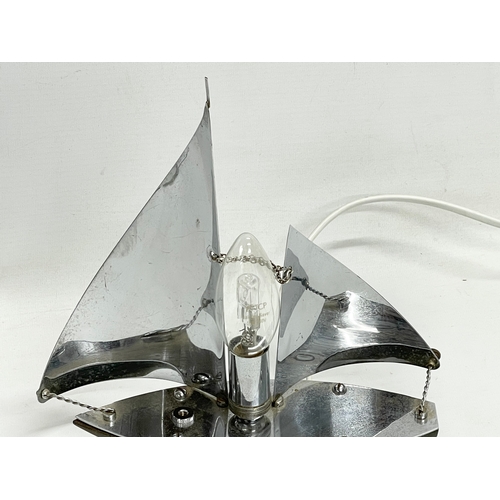 37 - A 1930’s Art Deco chrome lamp in the style of a yacht. 22x23cm