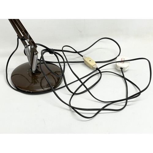 224 - A vintage angle poise lamp. Largest 83cm