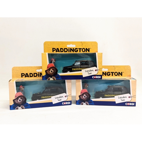 301 - 3 Corgi models of Paddington London Taxi