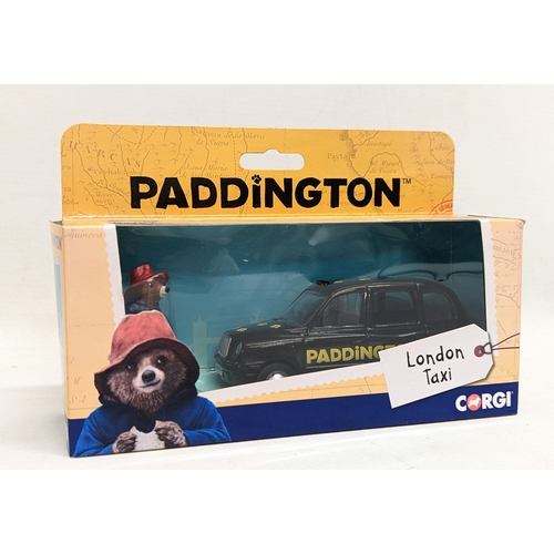 301 - 3 Corgi models of Paddington London Taxi