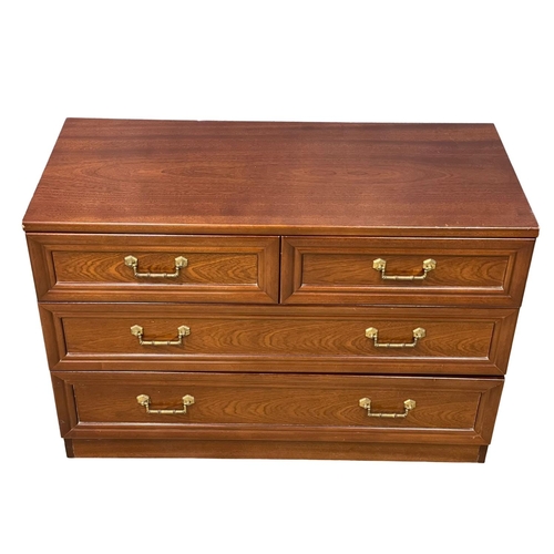 234 - A 4 piece G-Plan mahogany bedroom suite. 2 chests of drawers and a pair of bedsides. Tall chest meas... 