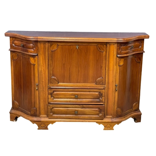 235 - A mahogany serpentine front sideboard. 151x40.5x98.5cm