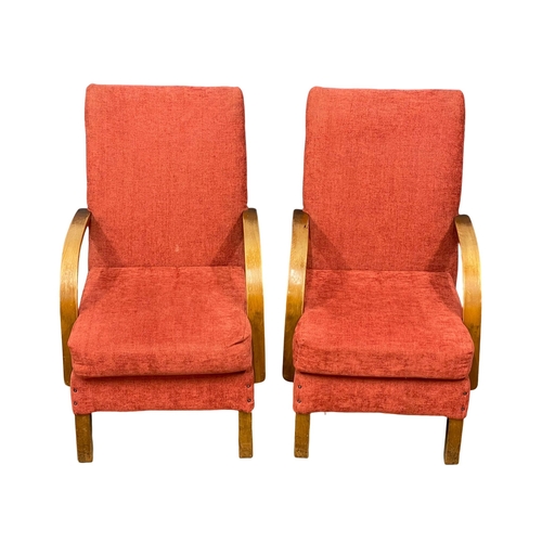 237 - A pair of vintage armchairs.