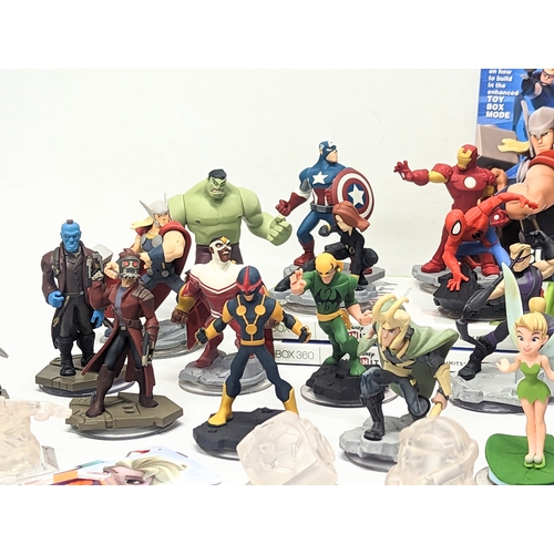 195 - A quantity of Disney Infinity Figures, including Disney princesses, Marvel, with 2 XBox 360 Disney I... 