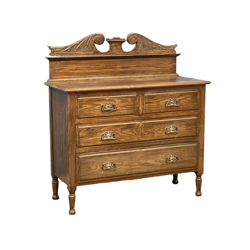 117 - An Edwardian oak gallery back chest of drawers with copper Art Nouveau handles. 107x46x117cm