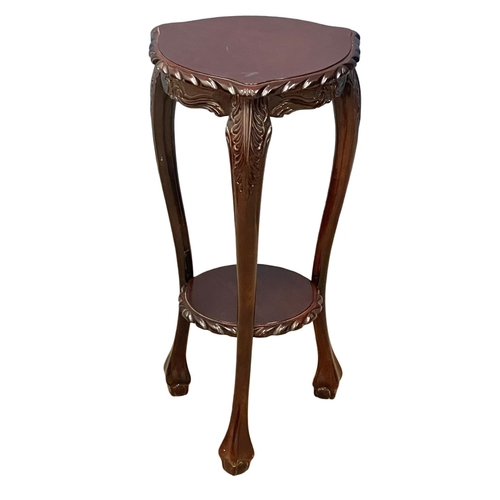 123 - A mahogany 2 tier plantstand. 35x37x72cm