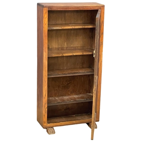 152 - A 1930’s Art Deco oak bookcase with lead glass doors. 57x20x117cm