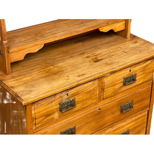 156 - An Edwardian satin walnut dressing chest. 92x44x162cm