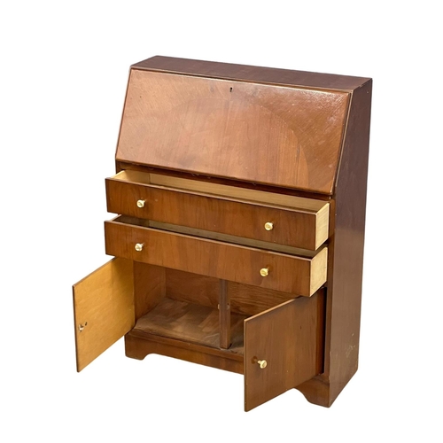 197 - A vintage writing bureau. 75x30x99.5cm