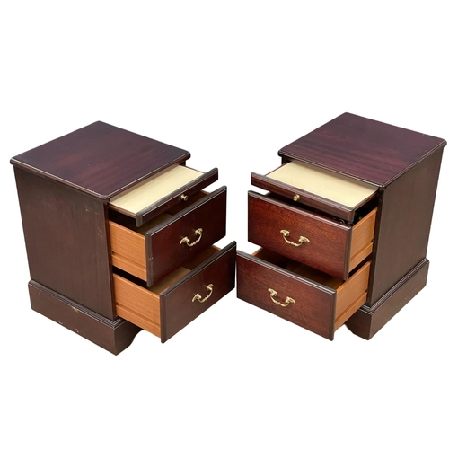 202 - A 3 piece mahogany bedroom suite. A tall chest of drawers and a pair of bedsides. Chest measures 78x... 