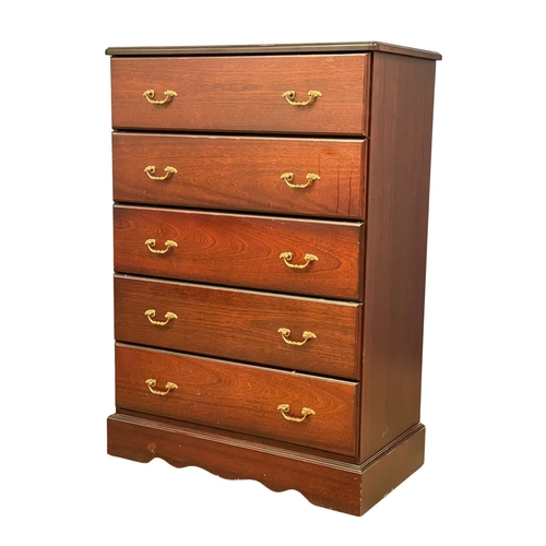 202 - A 3 piece mahogany bedroom suite. A tall chest of drawers and a pair of bedsides. Chest measures 78x... 