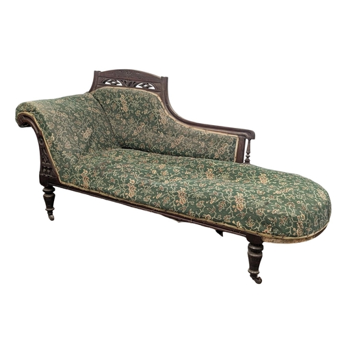 228 - A vintage chaise lounge. 190cm