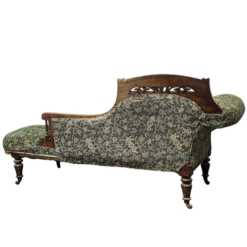 228 - A vintage chaise lounge. 190cm