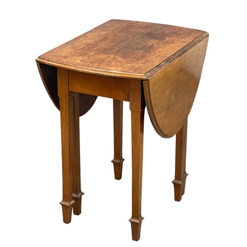 94 - A vintage Walnut drop leaf table. Open 115x71x76.5cm. Closed 49x71x76.5cm