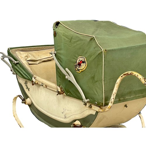 A vintage twin dolls pram by Royale.
