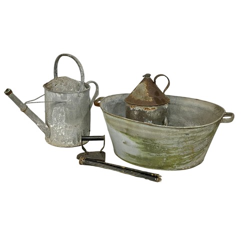 599 - A vintage galvanised basin and watering can etc.