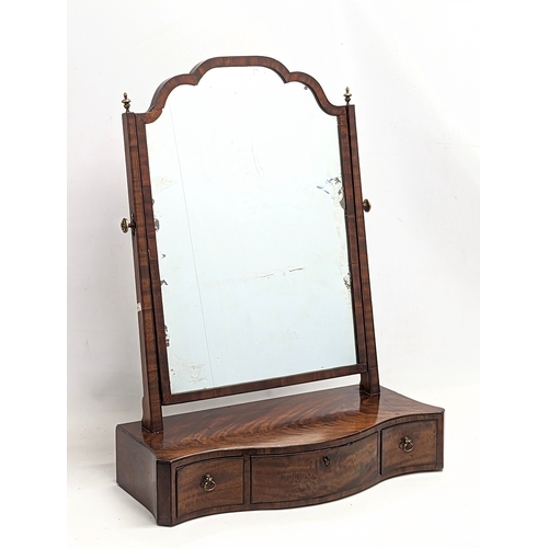 1061 - A George III mahogany table top dressing mirror with original handles, circa 1800. 51x22x66cm