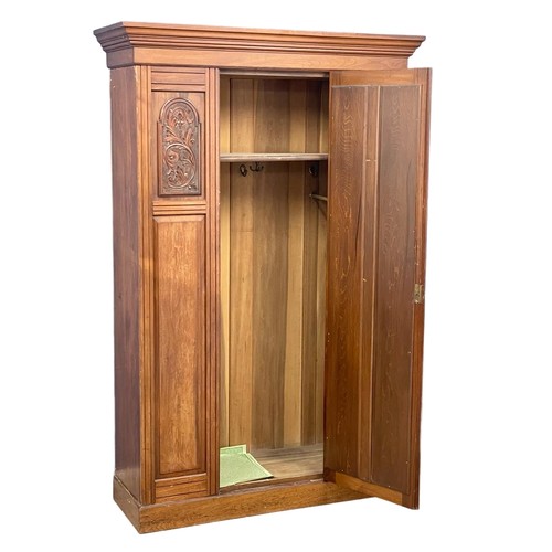 118 - An Edwardian wardrobe. 133x48.5x207cm