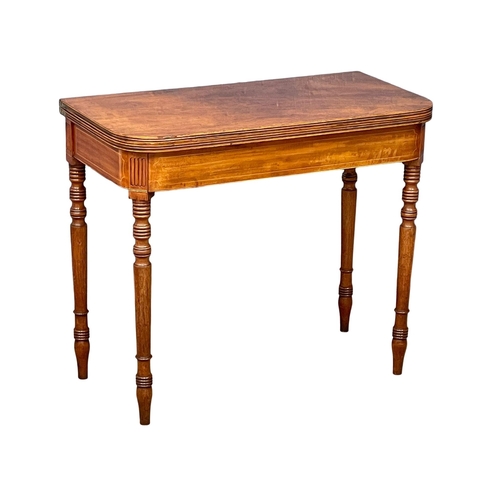 1696 - A George IV inlaid mahogany turnover tea table. Circa 1820. 87x45x74.5cm