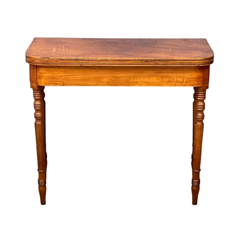 1696 - A George IV inlaid mahogany turnover tea table. Circa 1820. 87x45x74.5cm