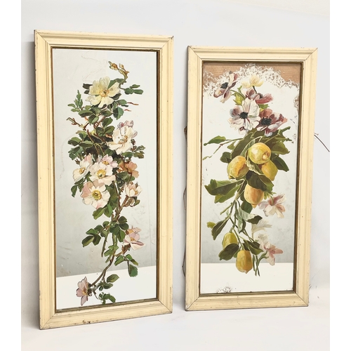 522 - A pair of early 20th century mirrors with hand painted flower decoration. Largest 42x89cm