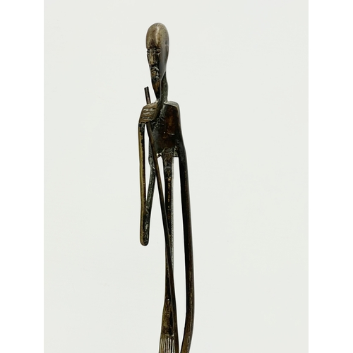 605 - A vintage large African Bronze figure. 58cm