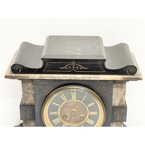 74 - A large Victorian slate and marble mantle clock with pendulum. Londonderry maker. 31.5x16x32cm