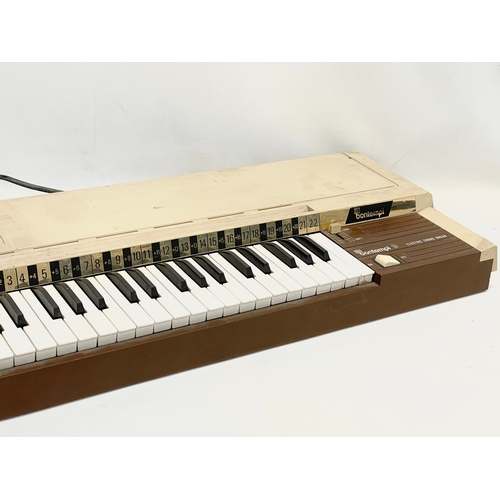 261 - A vintage Bontempi Electric Chord Organ and a Tannoy speaker.