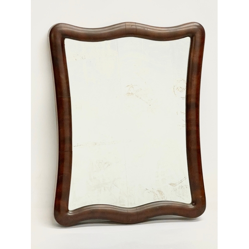 4 - A Victorian mahogany framed mirror. 37x47.5cm