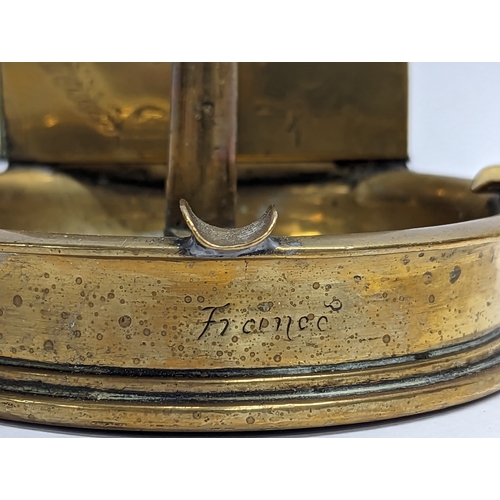 22 - A World War I brass Trench Art desktop ashtray, dating 1917. 11.5x9cm