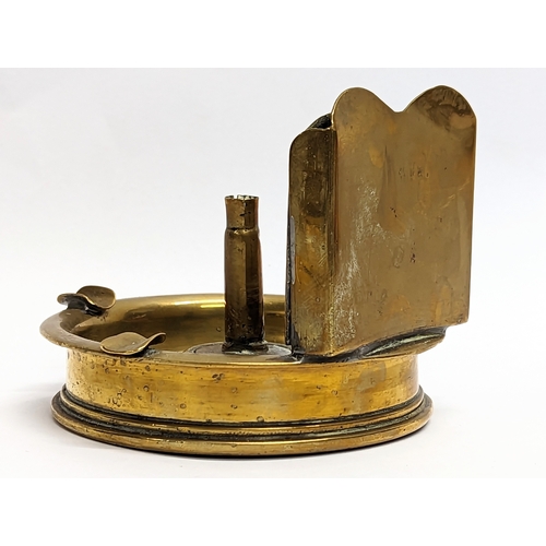 22 - A World War I brass Trench Art desktop ashtray, dating 1917. 11.5x9cm