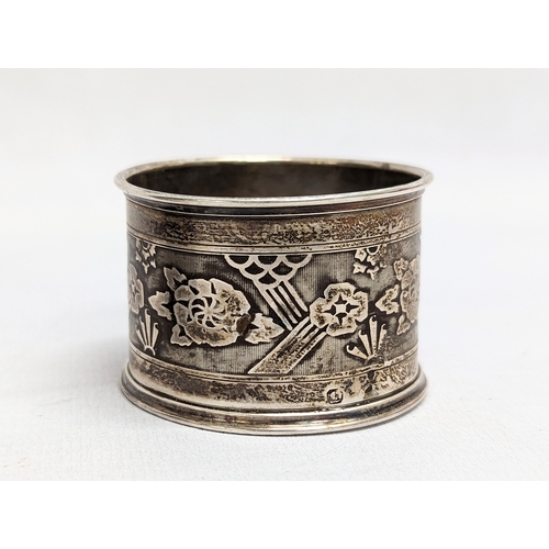 721 - 3 silver napkin rings, 1 Georgian and 1 French. 93.6g