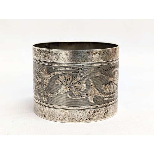 721 - 3 silver napkin rings, 1 Georgian and 1 French. 93.6g