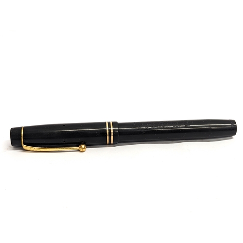 723 - A The De La Rue Pen with 14ct gold nib