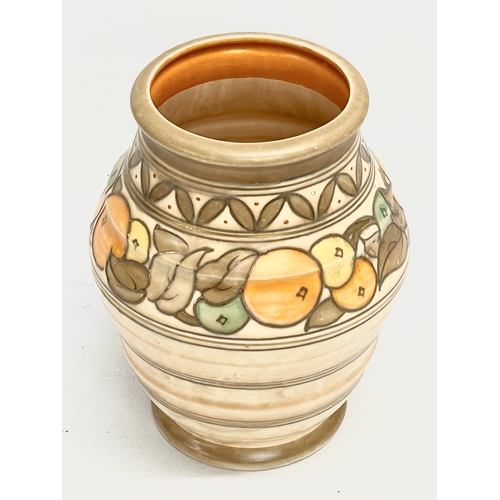 652 - A Charlotte Rhead pottery vase, designed for Crown Ducal, 5802. Number 235. 15x18cm