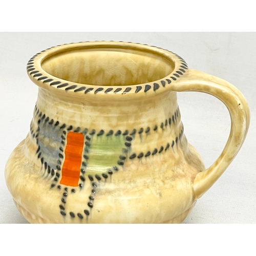 660 - A Charlotte Rhead pottery jug, designed for Crown Ducal. 16x13cm