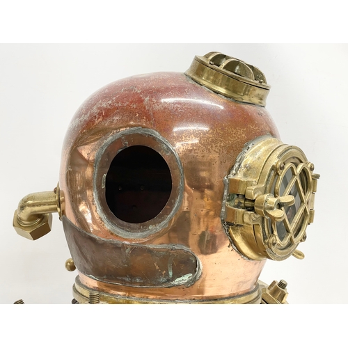 110 - A Morse Diving Equipment Co Inc brass and copper U.S. Navy Diving Helmet. Mark V. 36x47x56cm