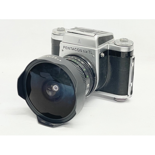 276 - A Pentacon Six TL camera in case with a Zodiak Lens for KIEV in case with accessories.