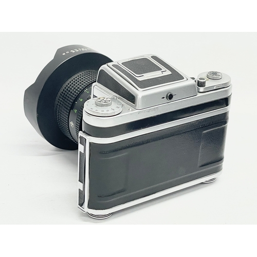 276 - A Pentacon Six TL camera in case with a Zodiak Lens for KIEV in case with accessories.